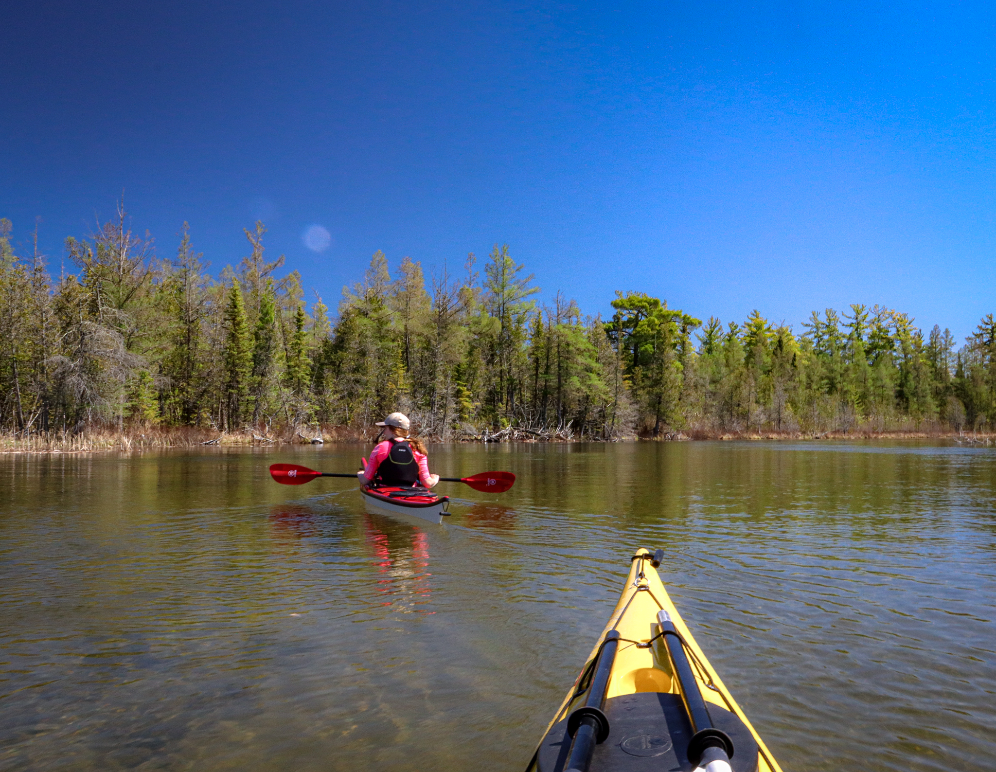 Kayaking on the crystal clear Grass River Near Traverse City, Michigan