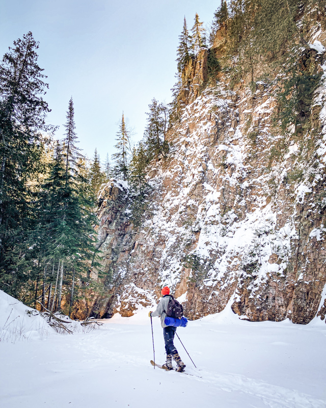 backcountry skier on frozen river in Northern Minnesota