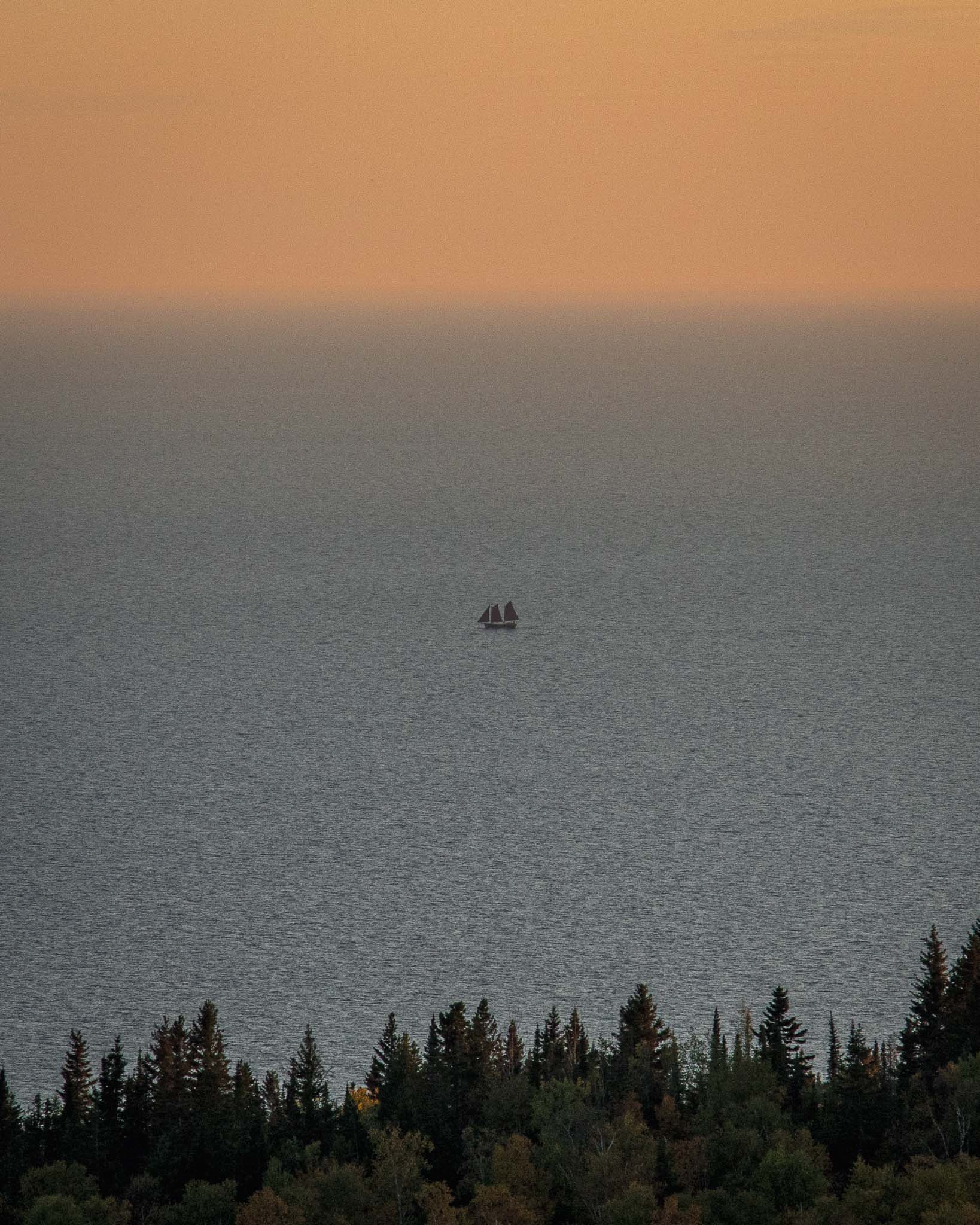 Hjordis ship from the Grand Marais North House Folk School on Lake Superior viewed from Pincushion Mountain Hiking Trail on the North Shore of Lake Superior