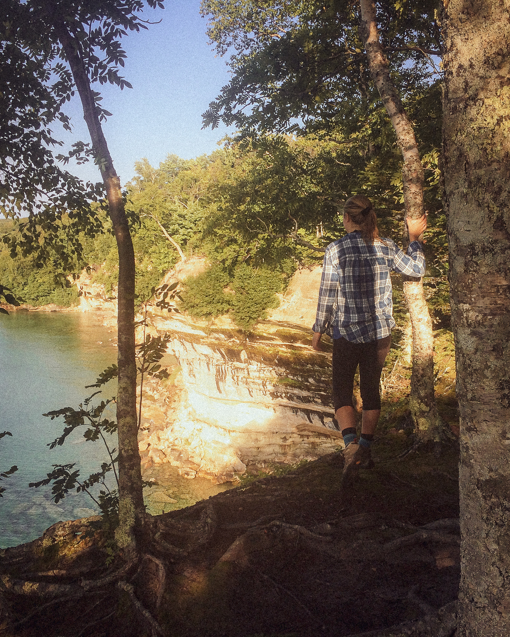A hiker in the pictured rocks, michigan
