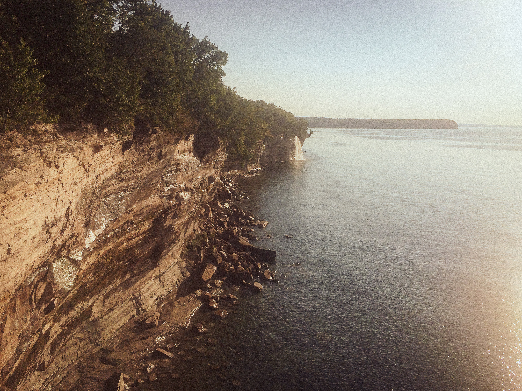 Image of spray falls in the pictured rocks from the Lakeshore Hiking Trail 