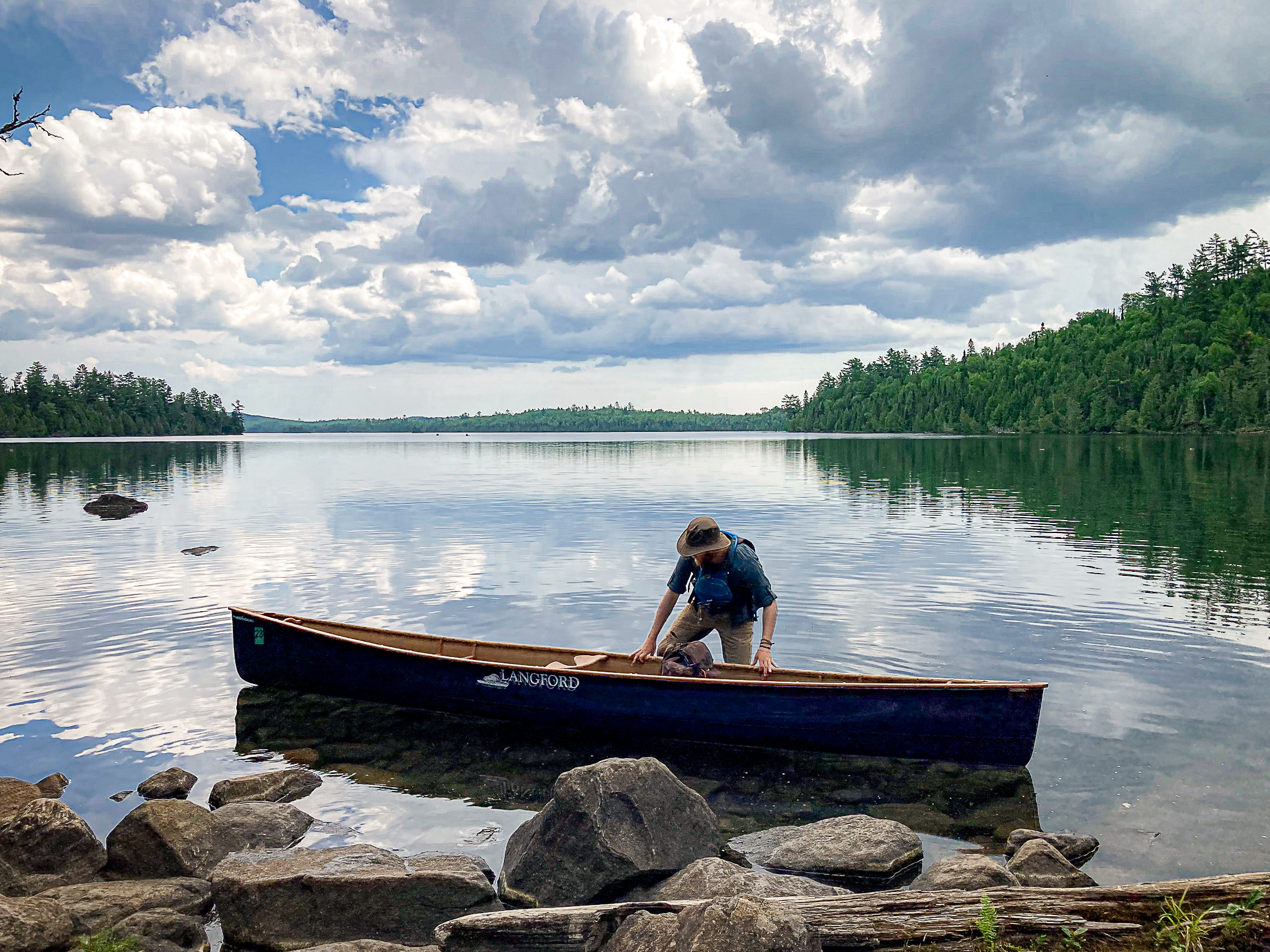 A canoist prepares for portage in the Boundary Waters (BWCA)