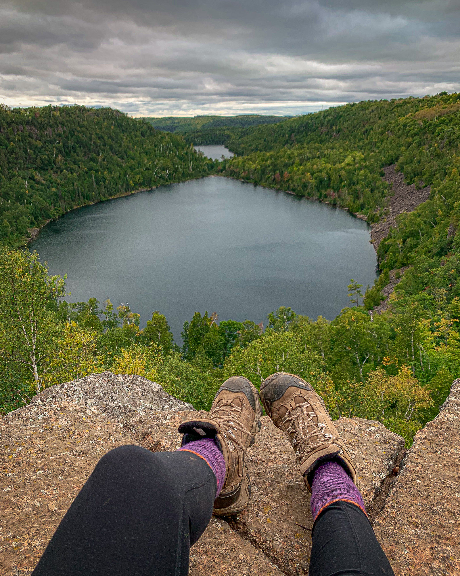 Hiking boots at iconic Bean and Bear Overlook on the North Shore of Minnesota