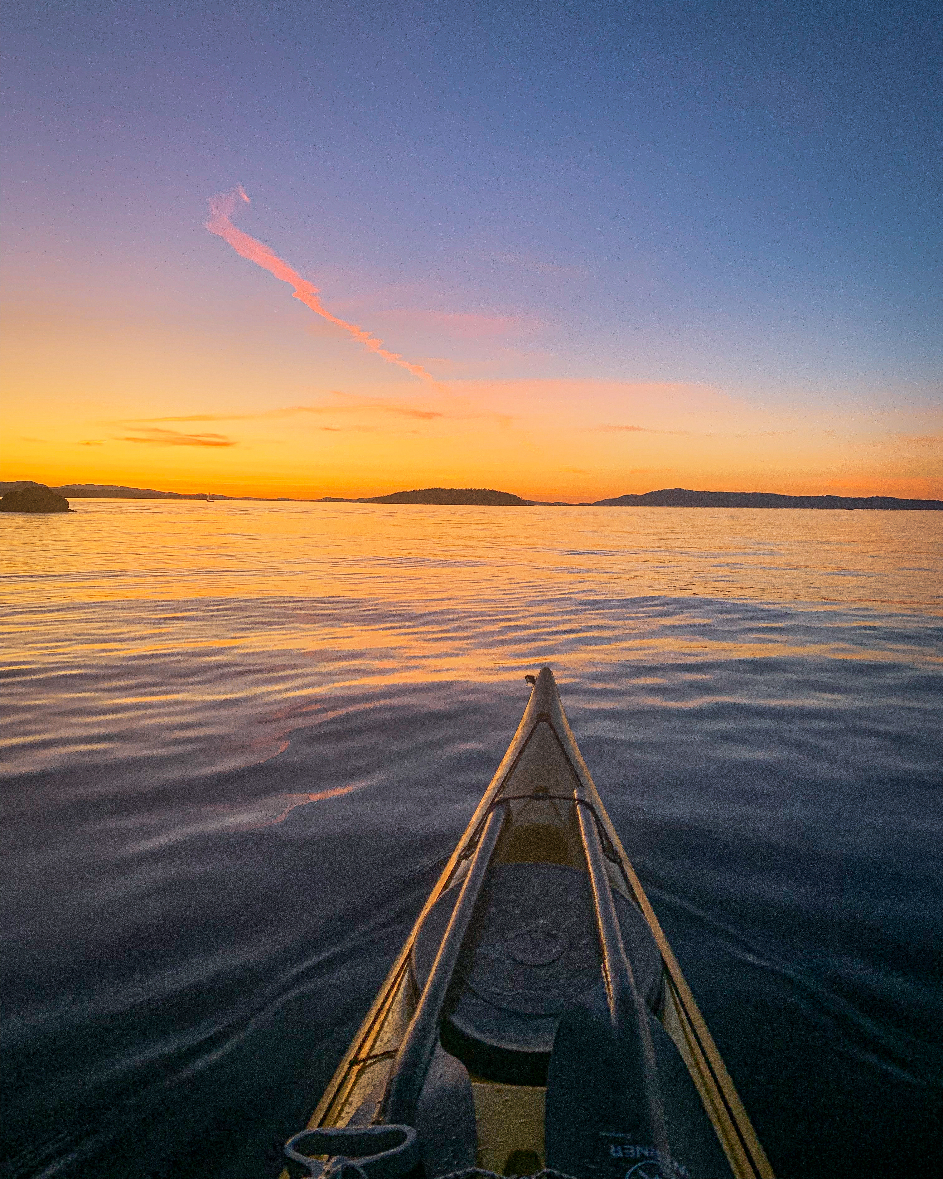 kayaking at sunset in the western san juan islands