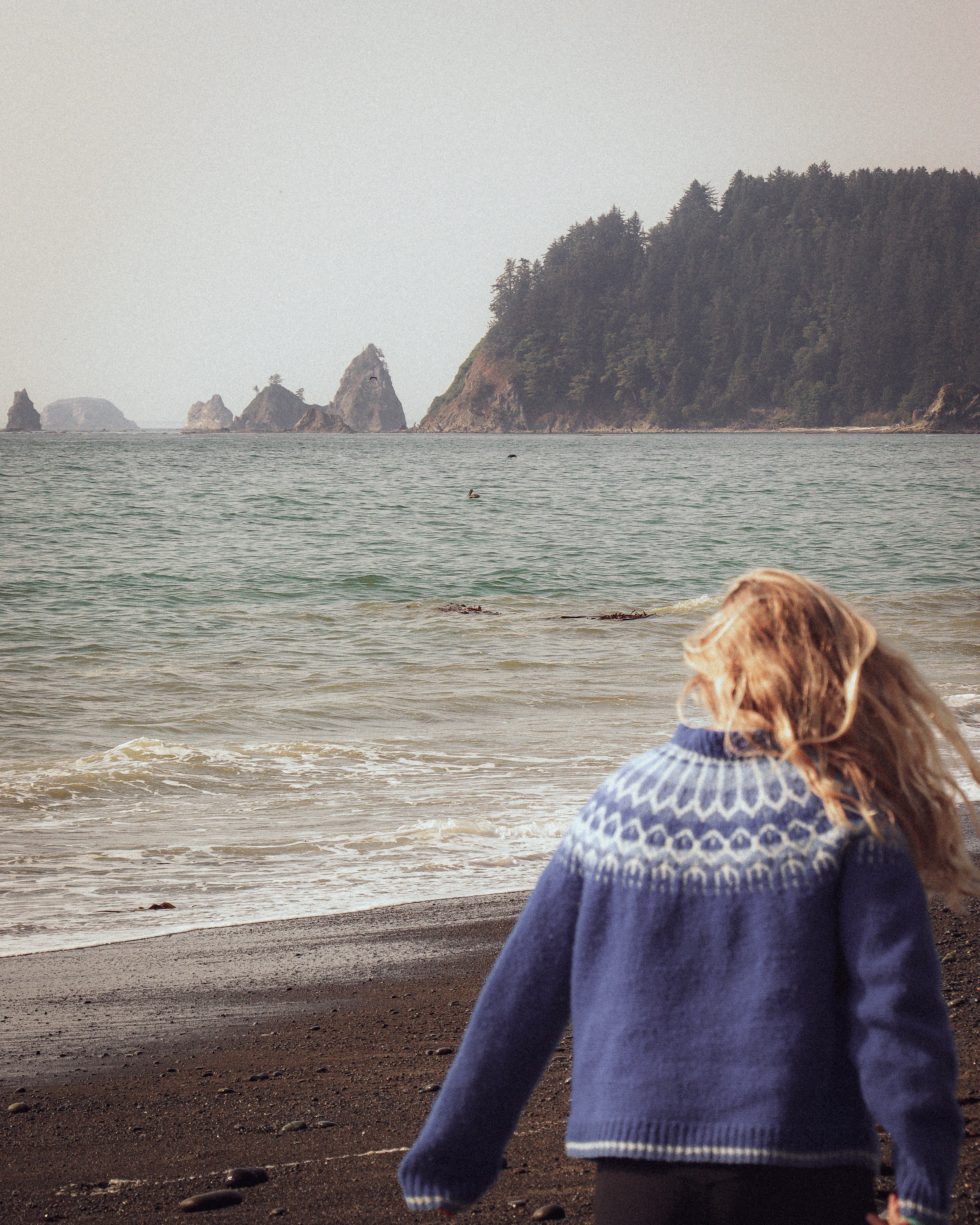 A woman on the beach in Olympic National Park