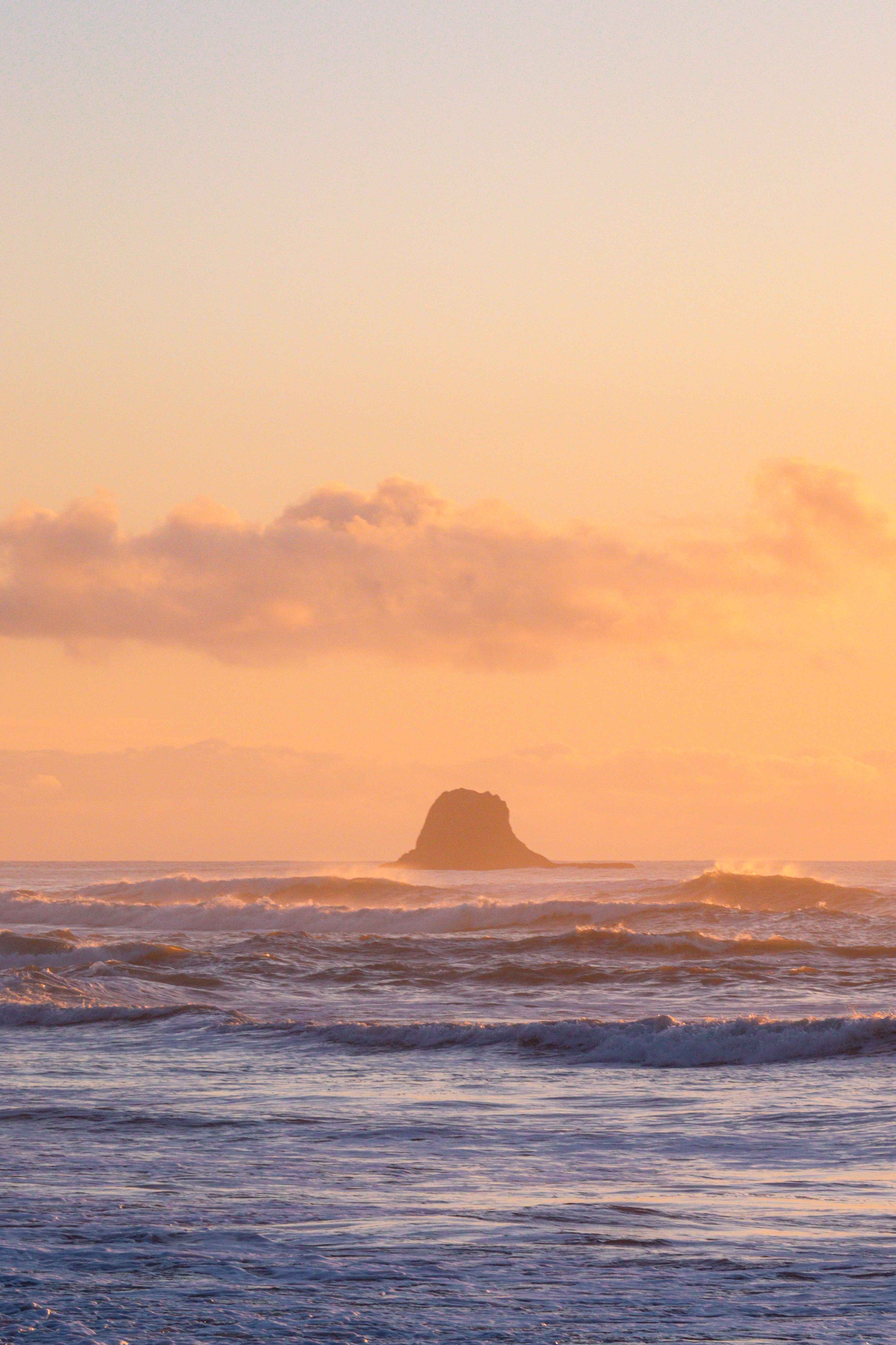 sunset at Ruby beach in Olympic National Park with waves crashing