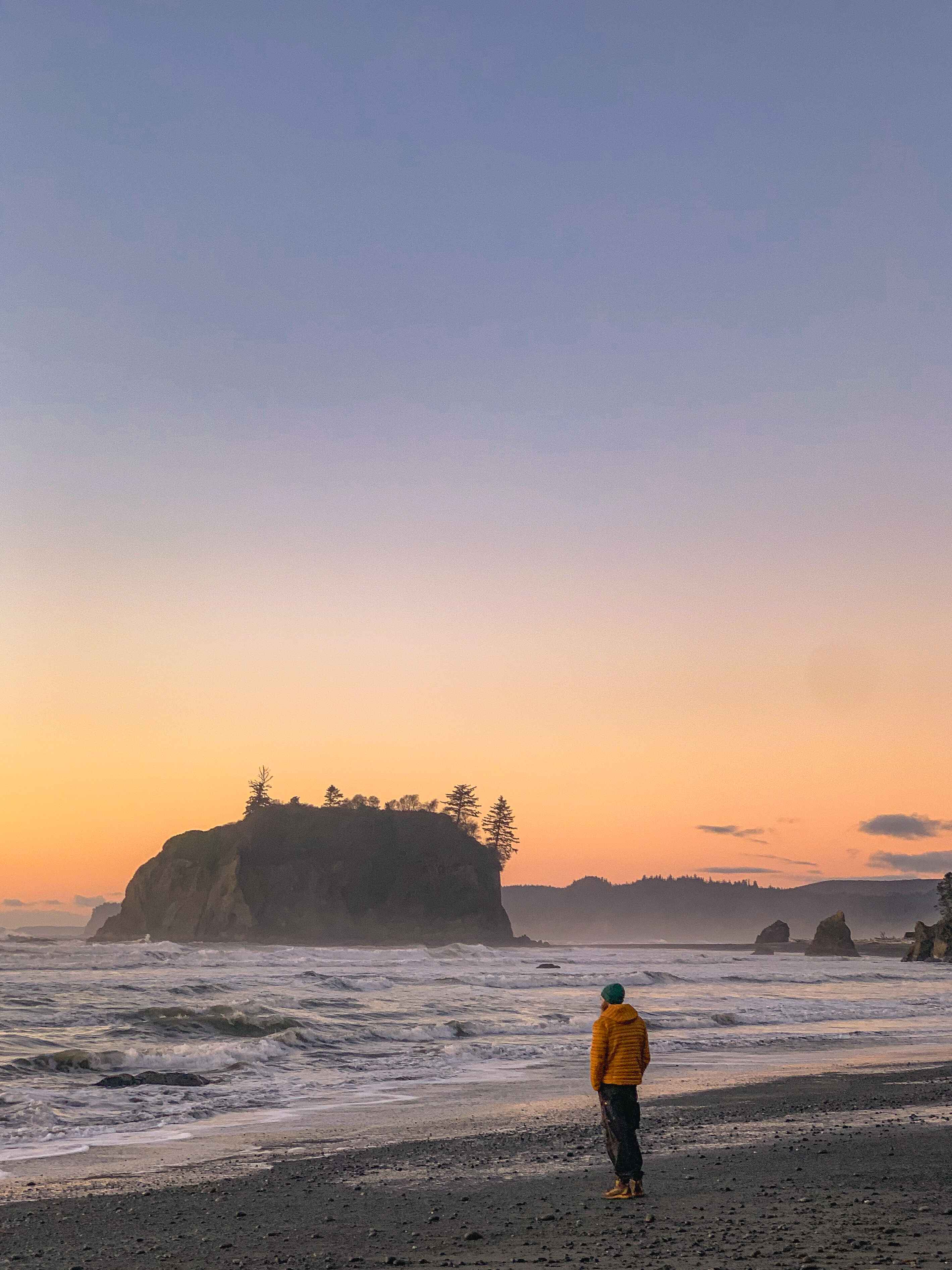 A hiker on Ruby Beach, Olympic National Park, Washingotn