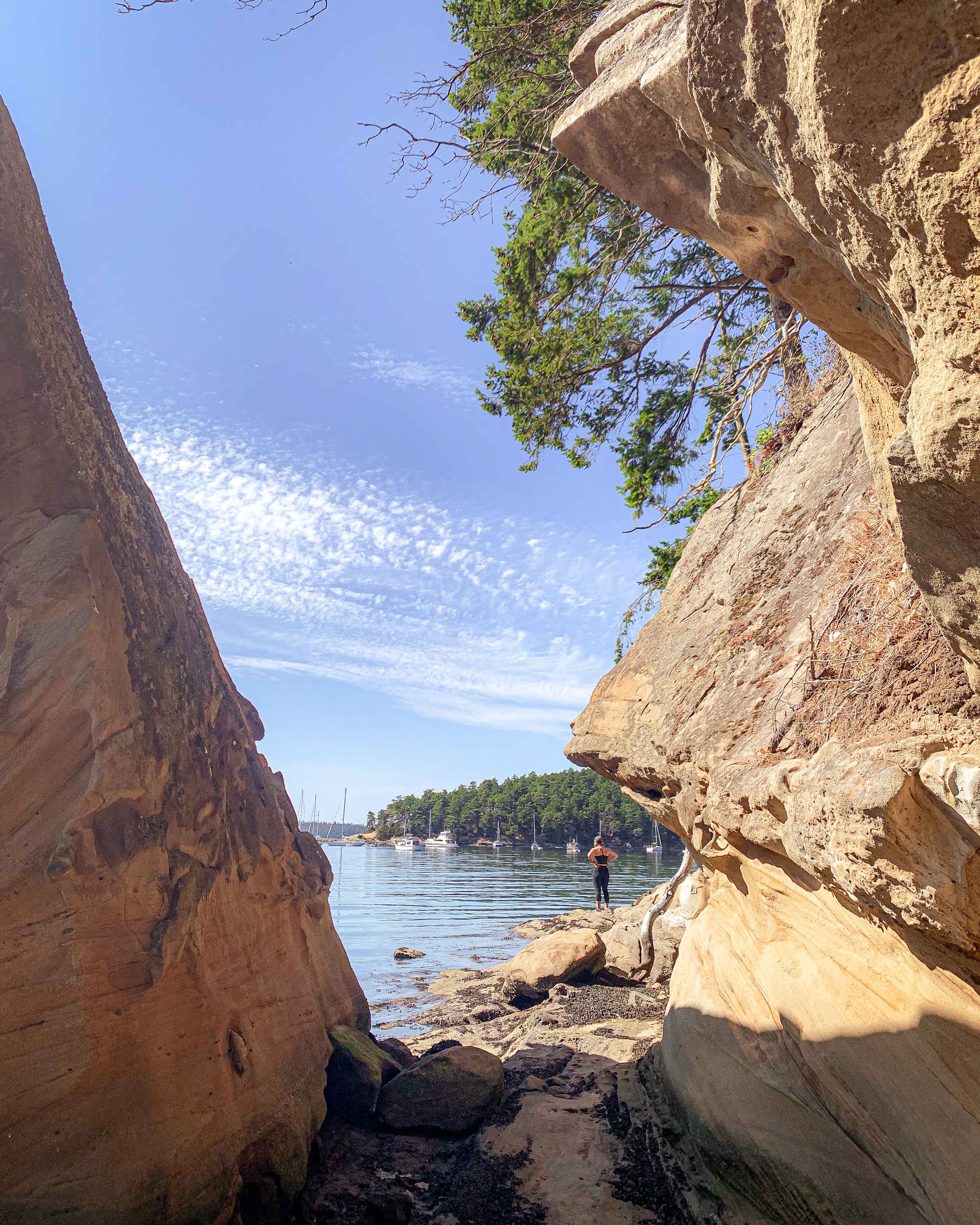 A hiker on Sucia Island in Washingtons San Juan Islands