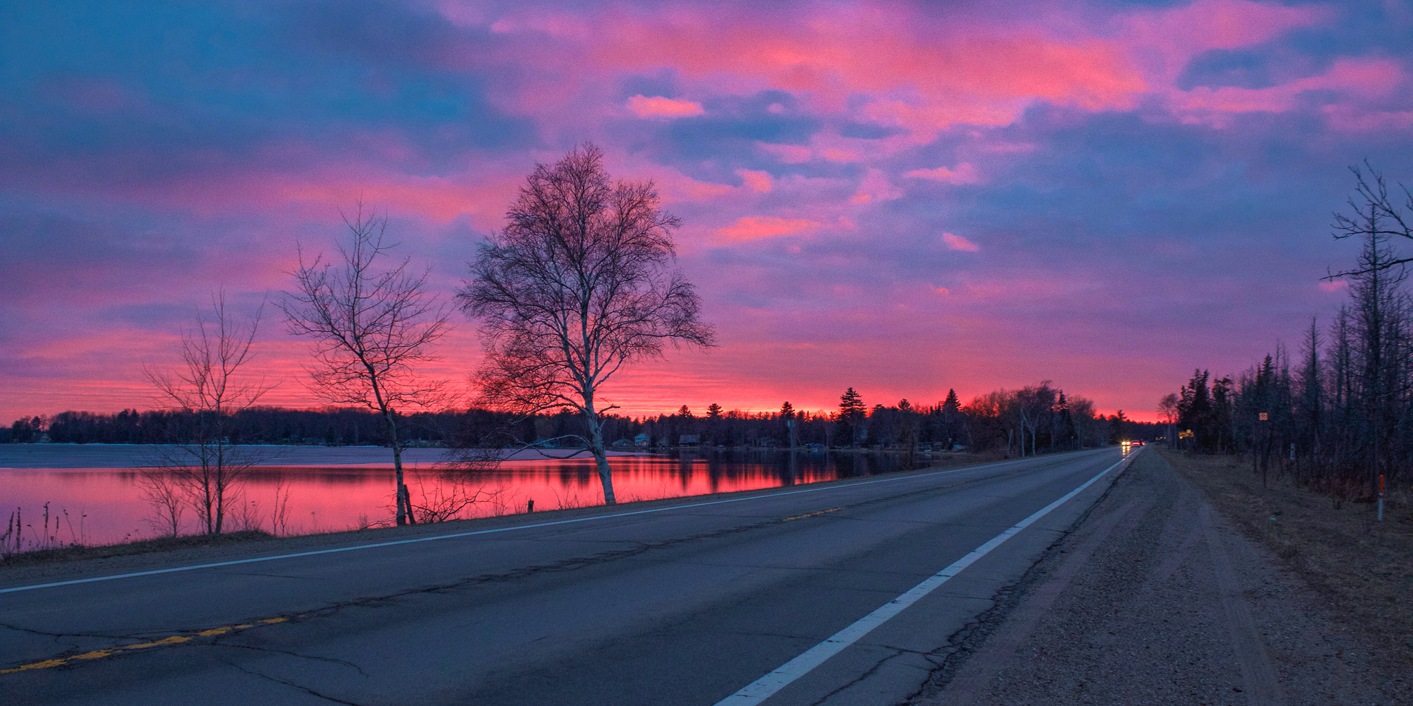 Image of a dramatic sunset on a road in Michigan