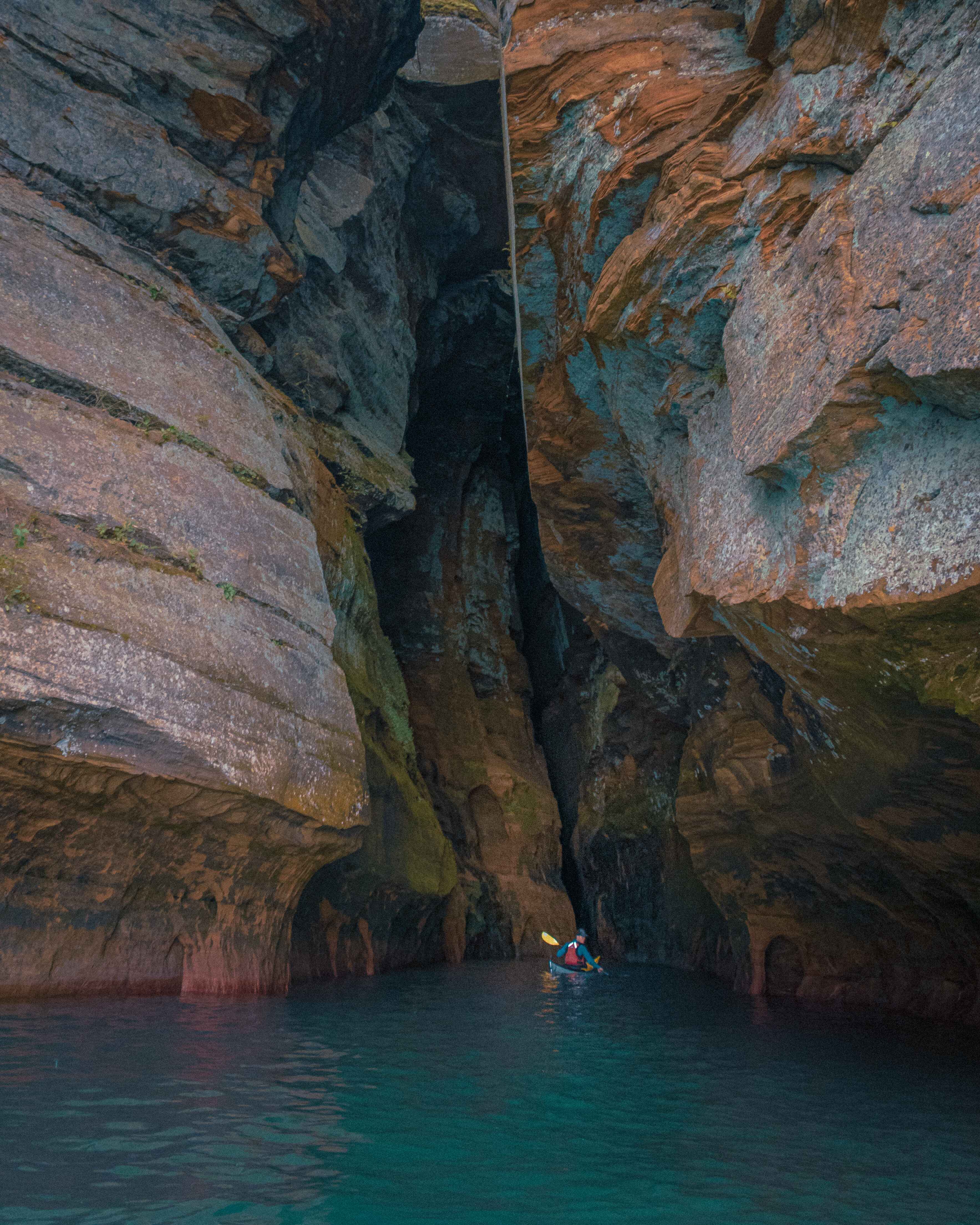 image of a kayaker in a large sea cave in Wisconsin's Apostle Islands National Lakeshore