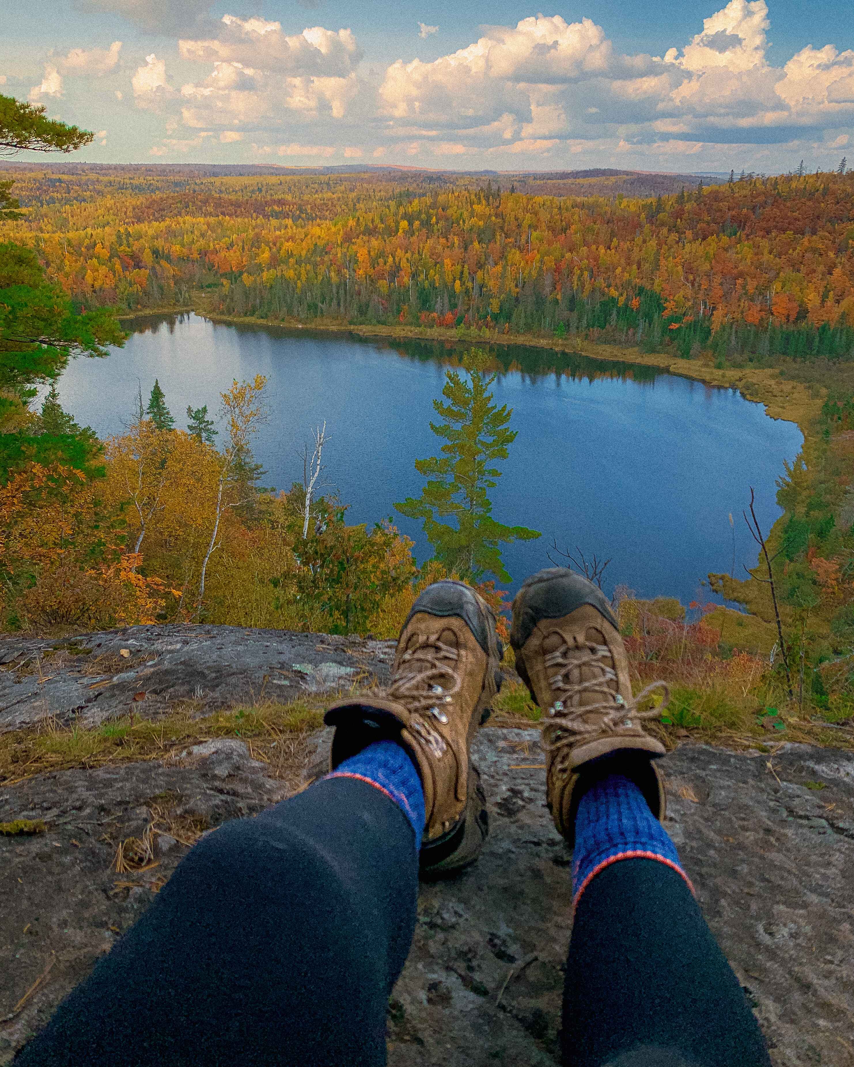 A hiker pauses to take in the view in Tettegouche State Park, Minnesota
