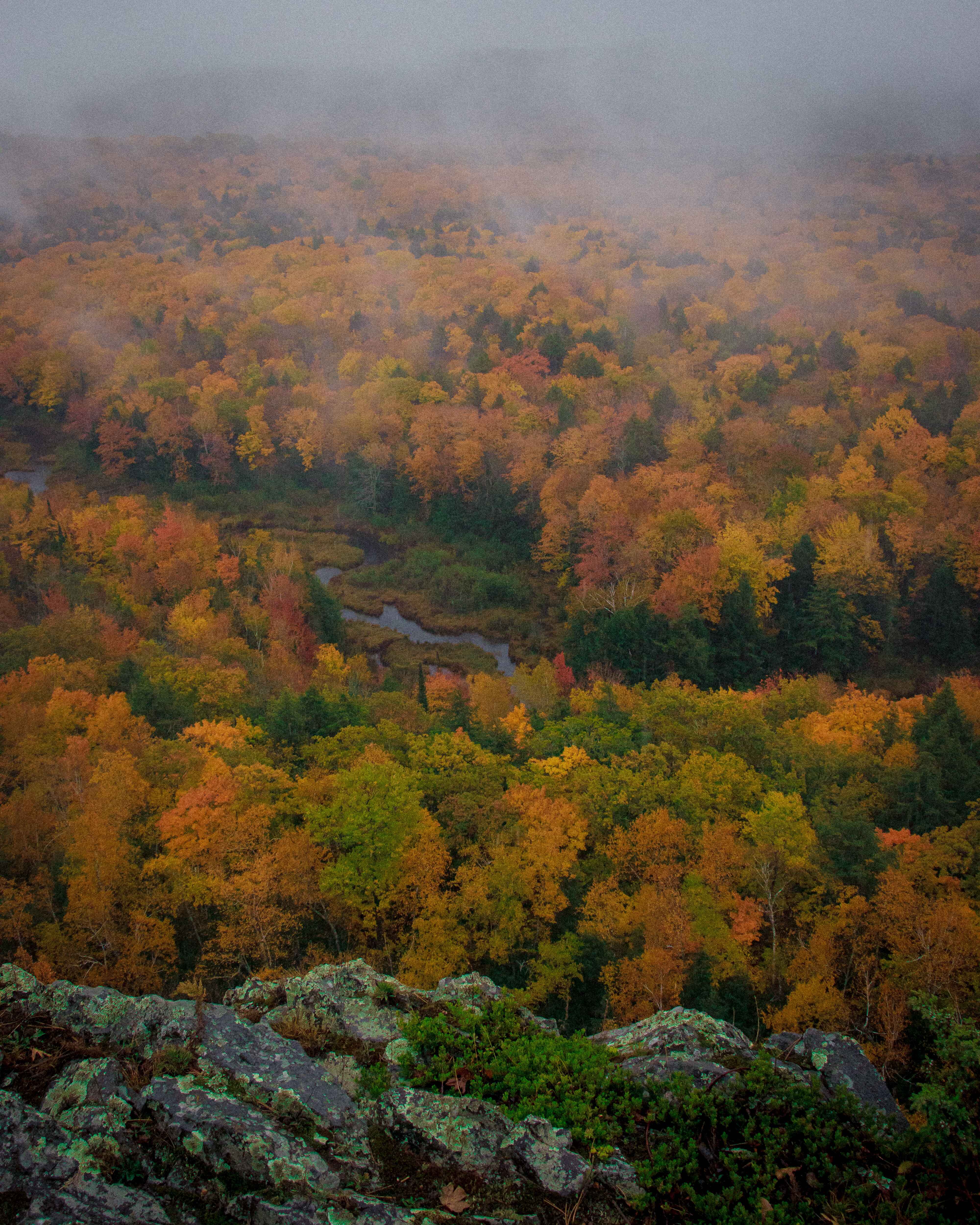 image of peak fall color in the porcupine mountains from the Escarpment Trail, Michigan