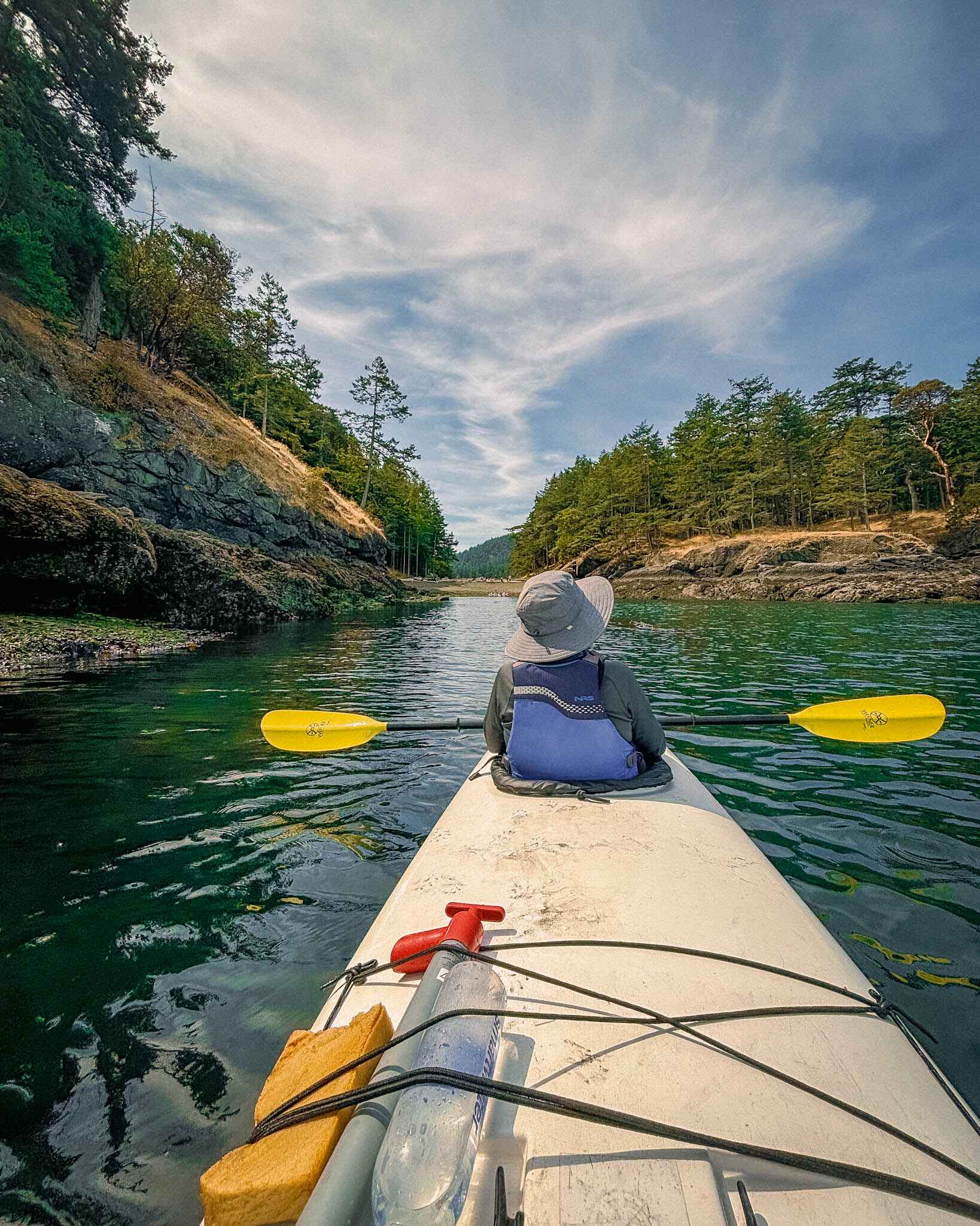 a sea kayaker in the san juan islands