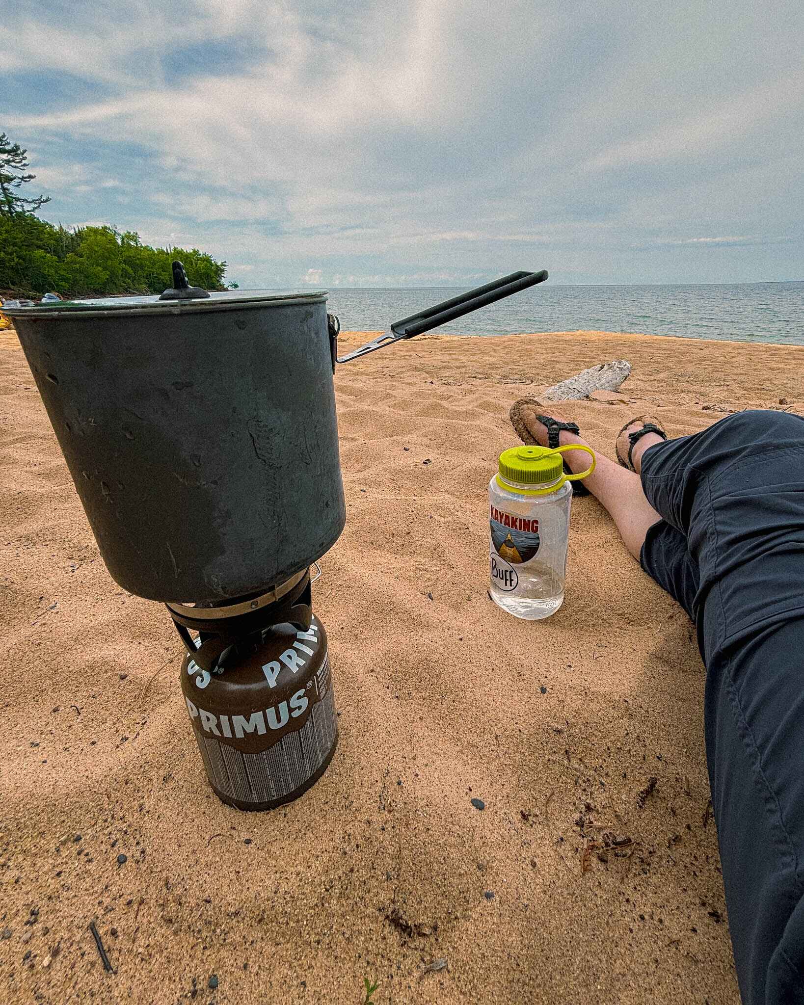 image of a camp stove on a beach