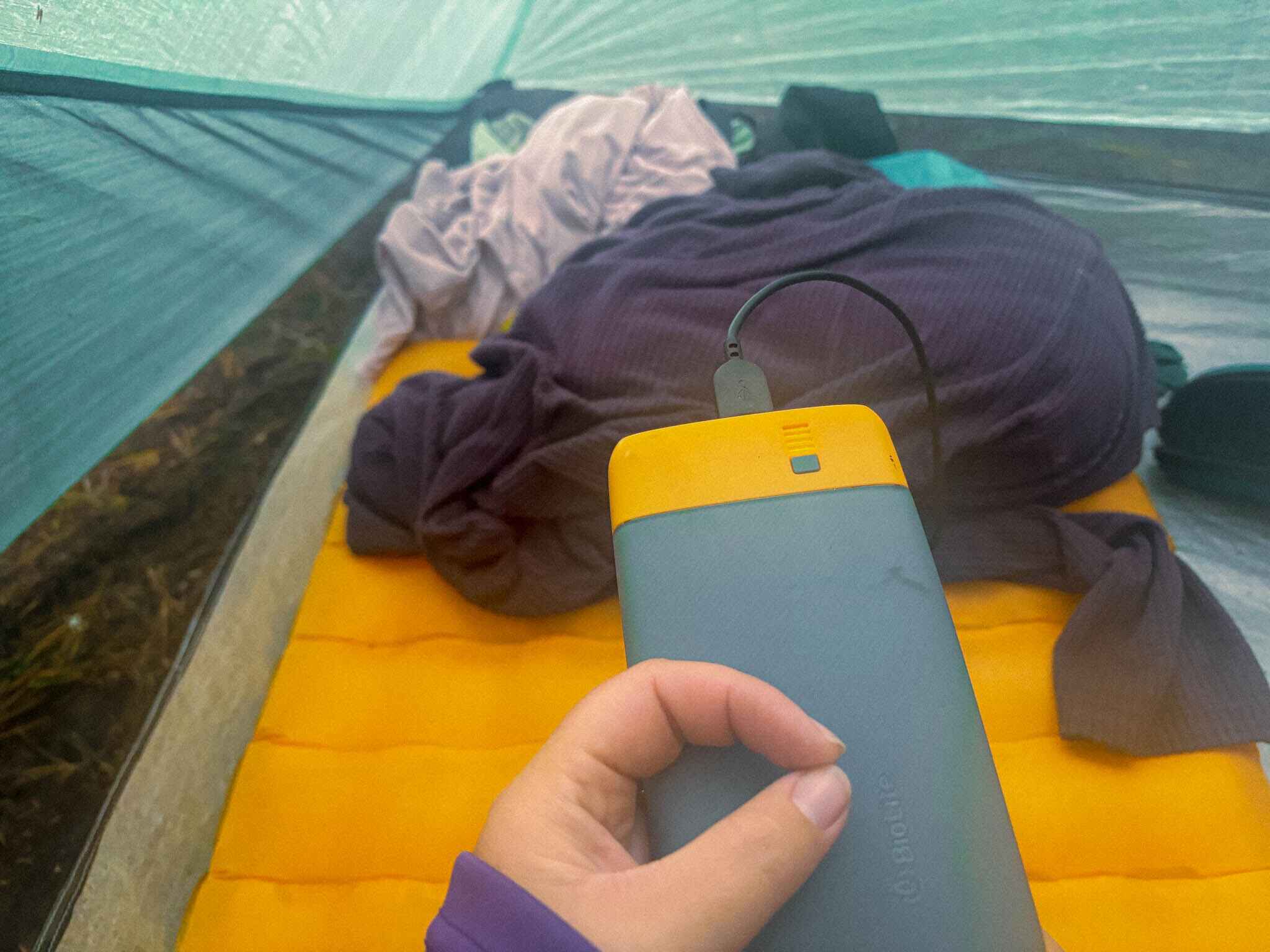 image of a power bank in a backpacking tent
