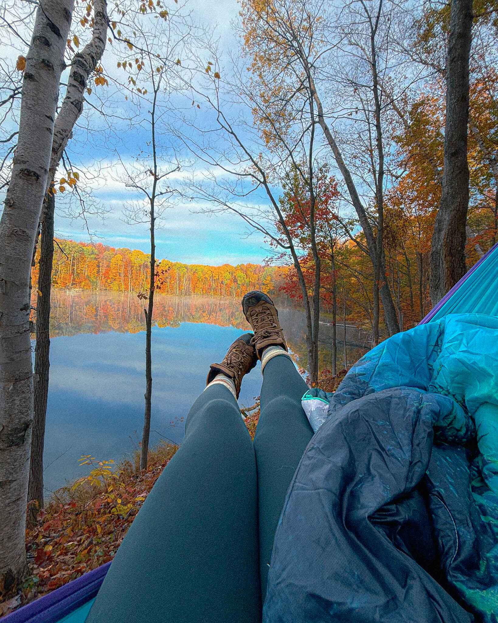 Image of a hammock strung up in front of a Lake near Traverse City, Michigan