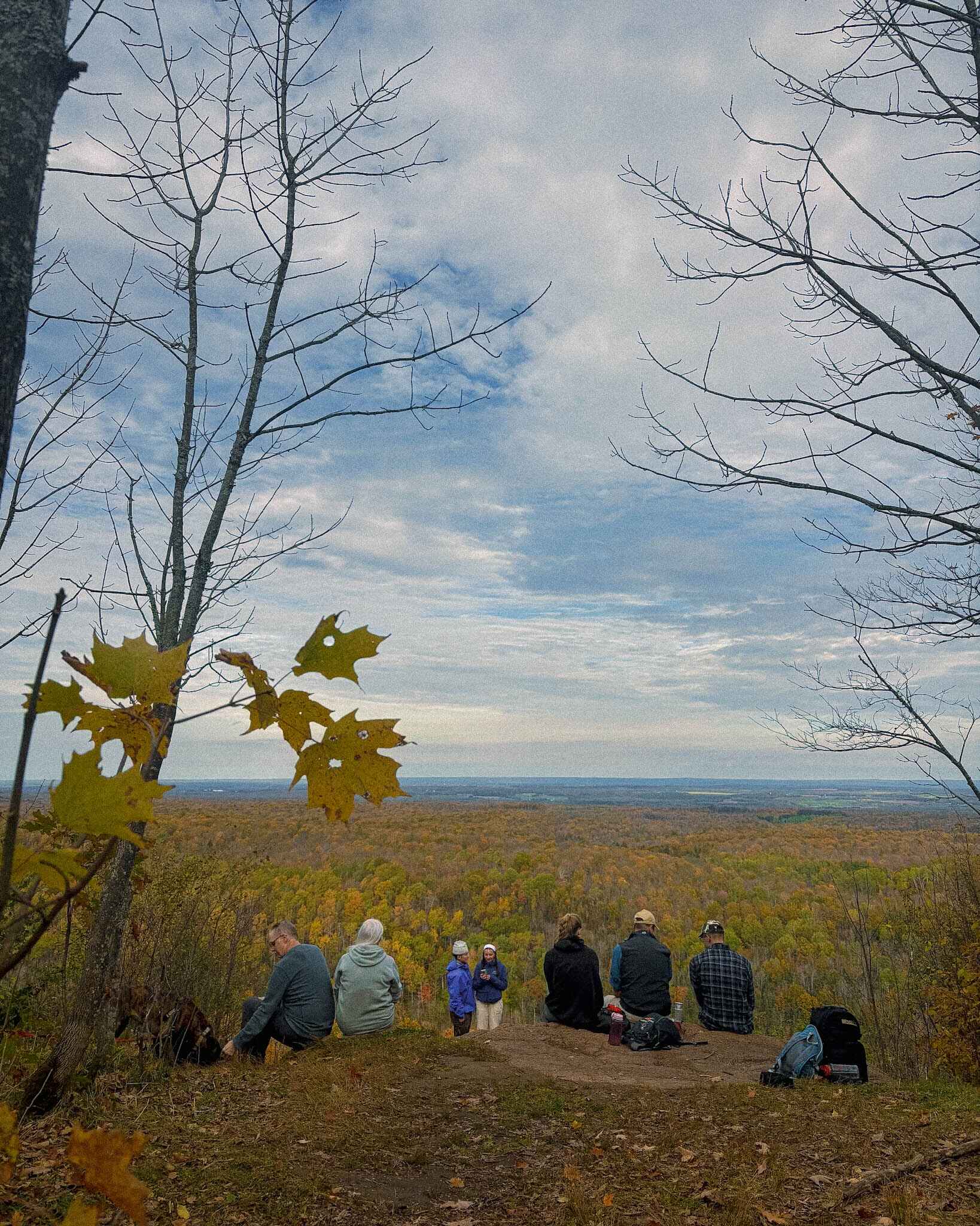 Hikers look out from St. Peters Dome in the Chequamegon Nicolet National Forest in Northern Wisconsin