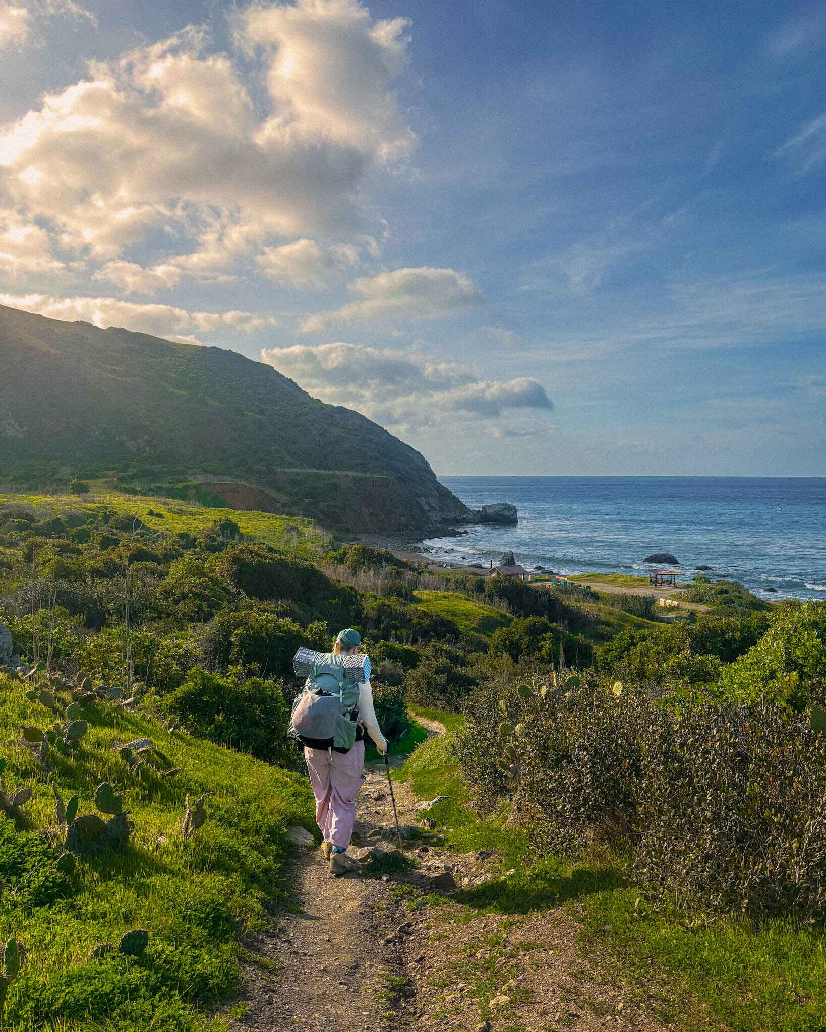 A backpacker hikes in to Parson's Landing on the Trans Catalina Trail