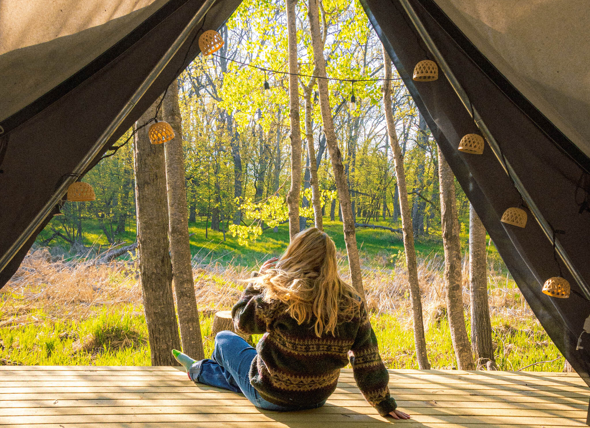 image of a woman at a glamping tent in battle lake minnesota