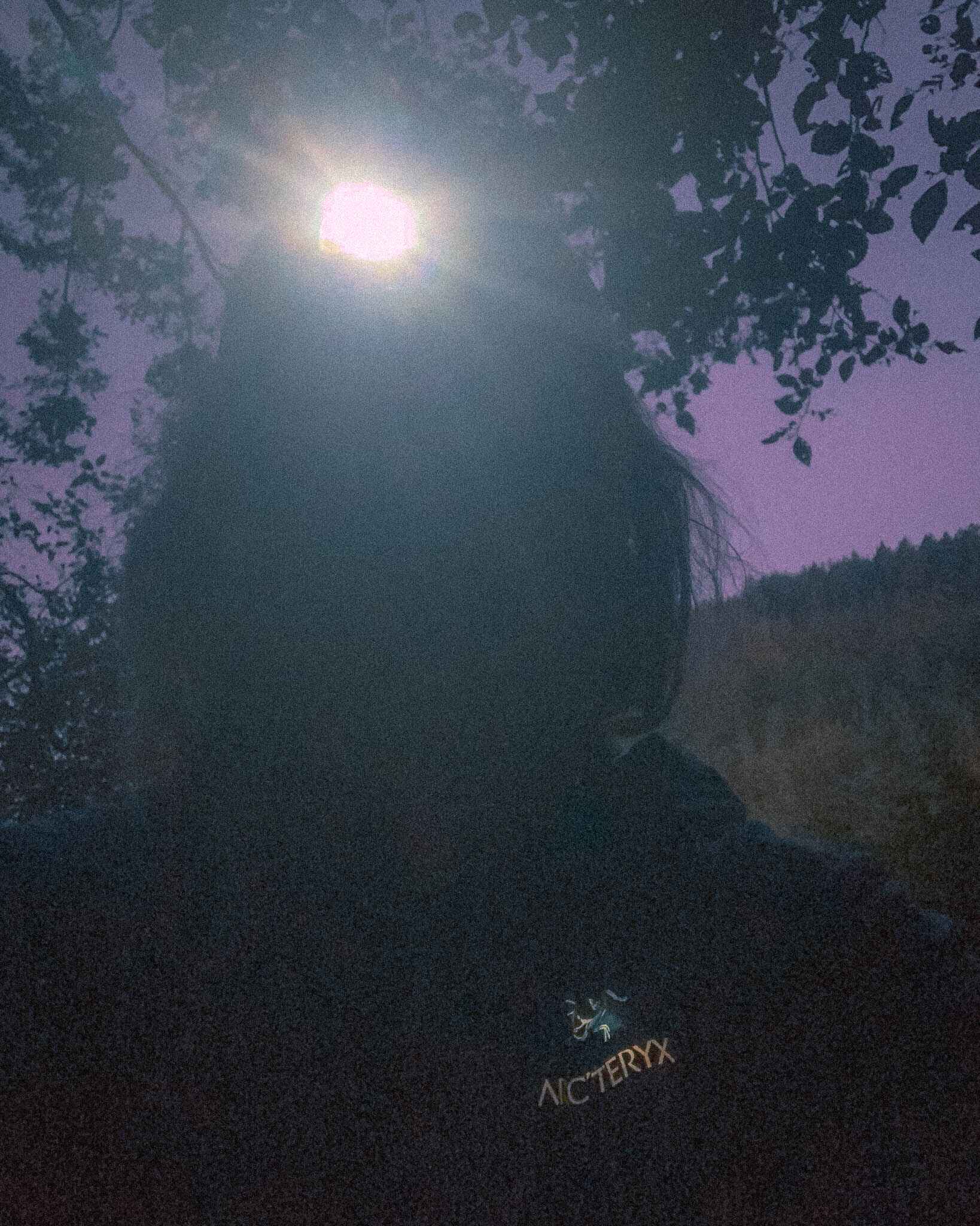 a woman with a headlamp in