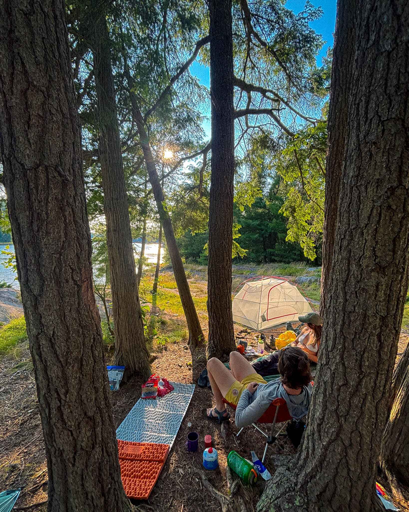 Hikers lounge at camp