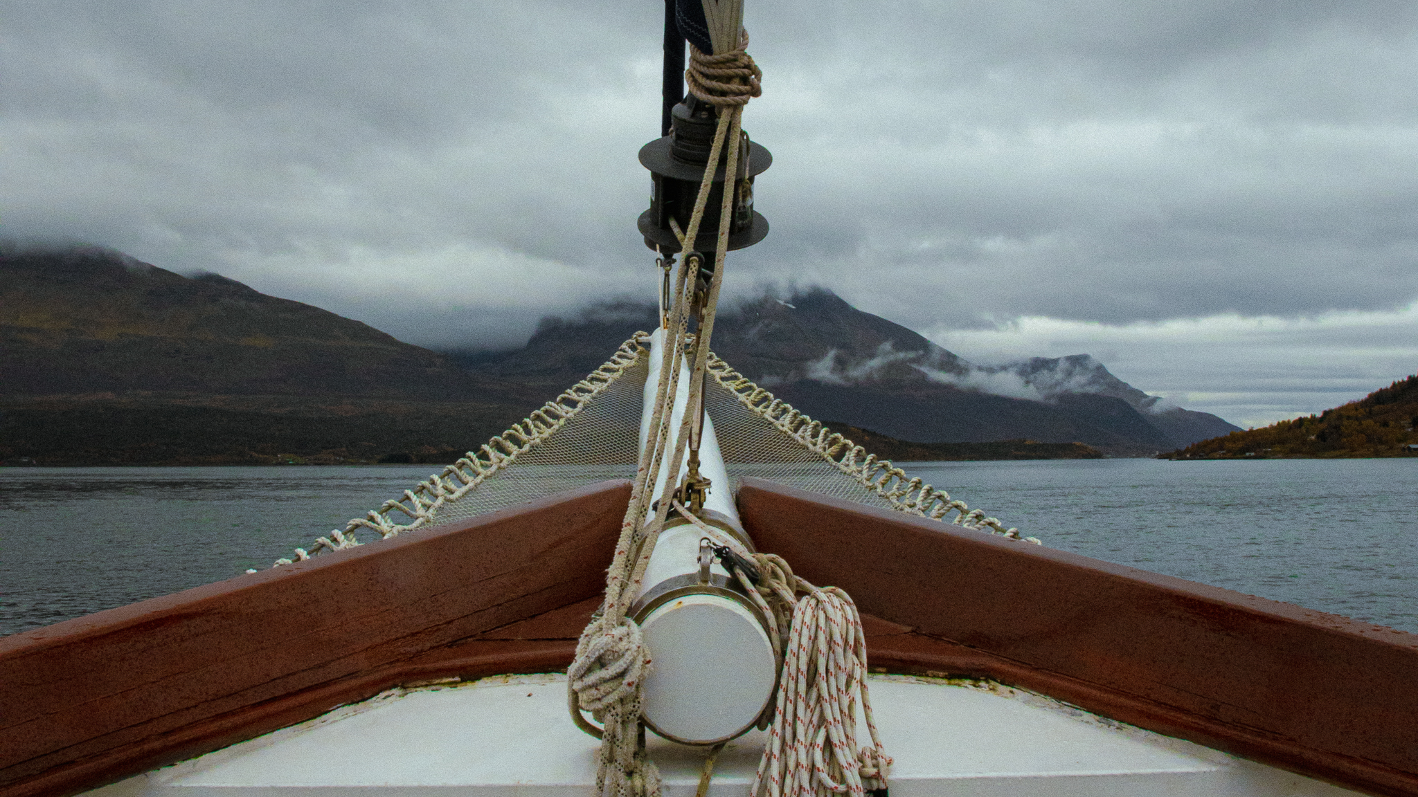 image of a boat on a fjord just south of Tromso, Norway